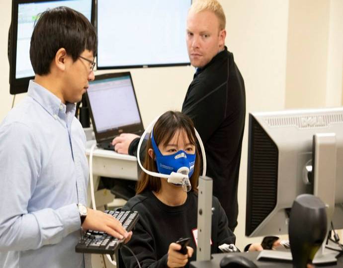 A person wearing a mask to measure VO2.