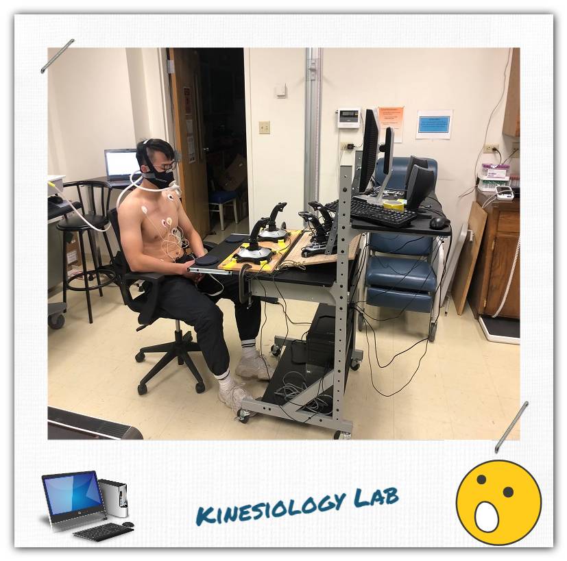 A man sits at a desk.