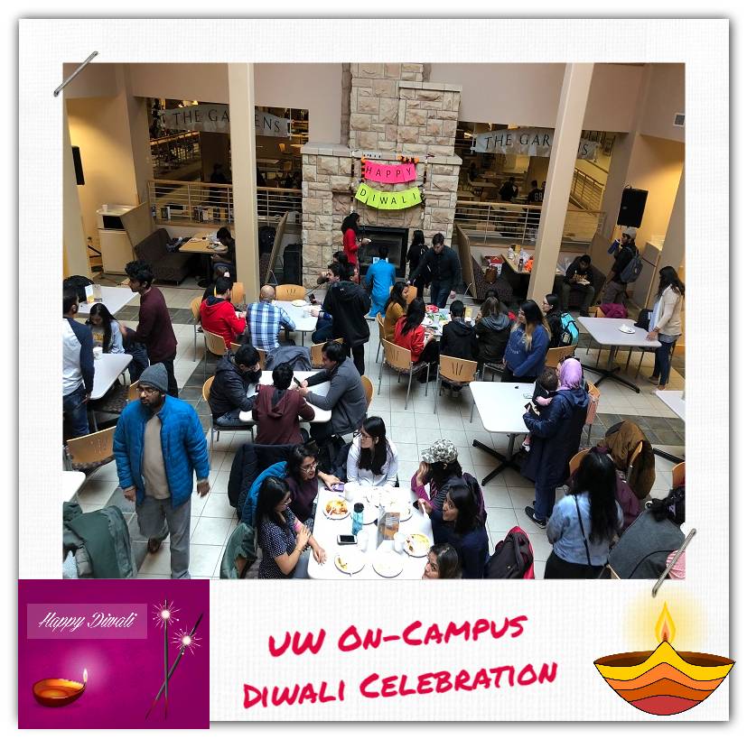 A picture taken from above of a large group of people sitting and standing together.