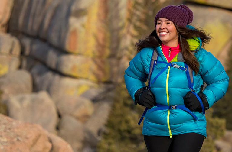 girl rock climbing in the mountains