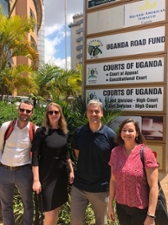 addie with Professor Novogrodsky and Jamie Crawford in front of the Ugandan courts