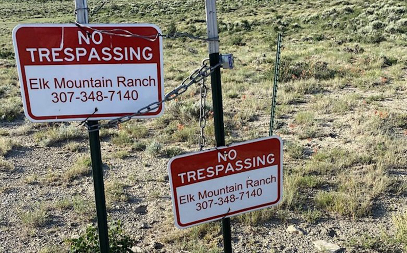 No trespassing signs on Elk Mountain Ranch