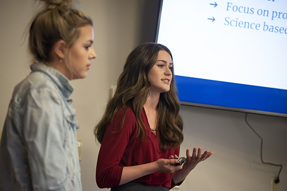 students giving presentation