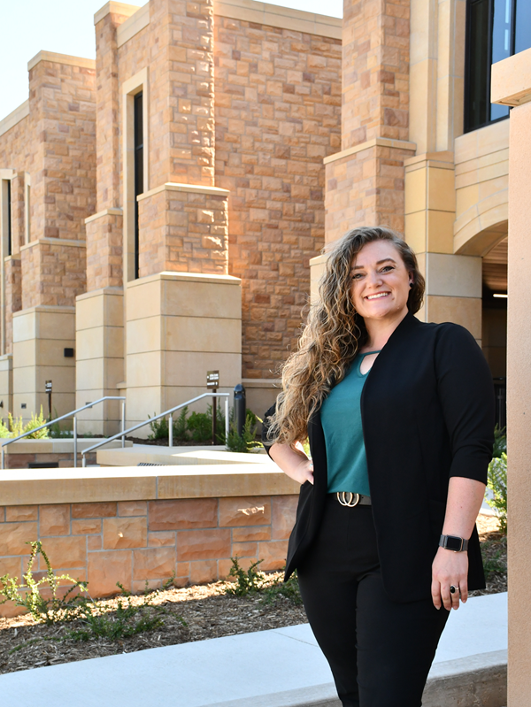 photo of Maggie Asay outside the College of Law