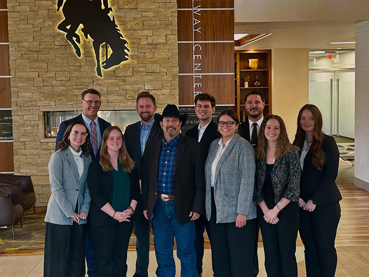 Law review students post with author C.J. Box