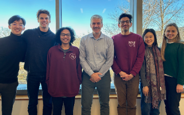 Noah Novogrodsky with group of Harvard students