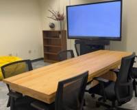 table and chairs in room 265a