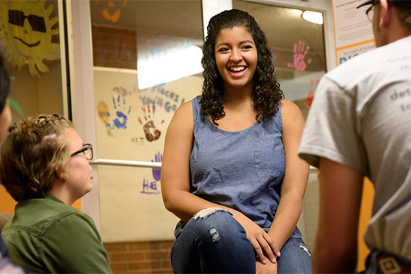 Students interacting in Fall Bridge