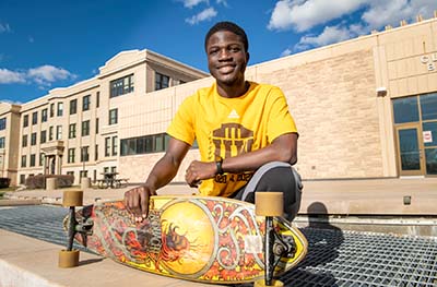 student-with-skateboard-400.jpg