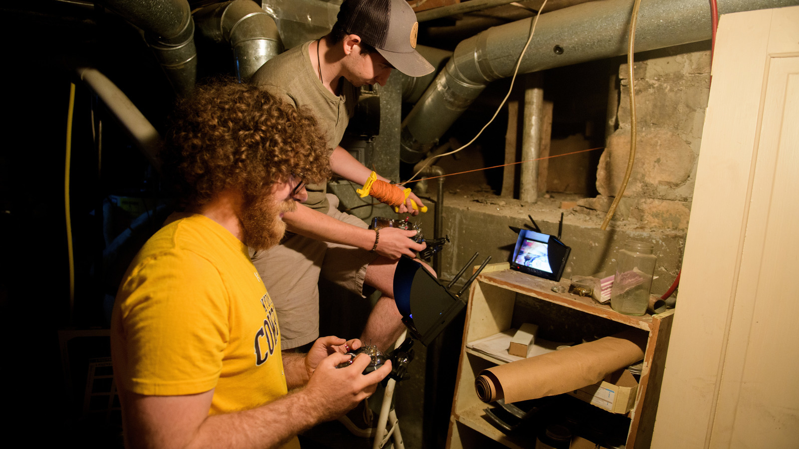 Uplink Robotics LLC employees work on a problem.