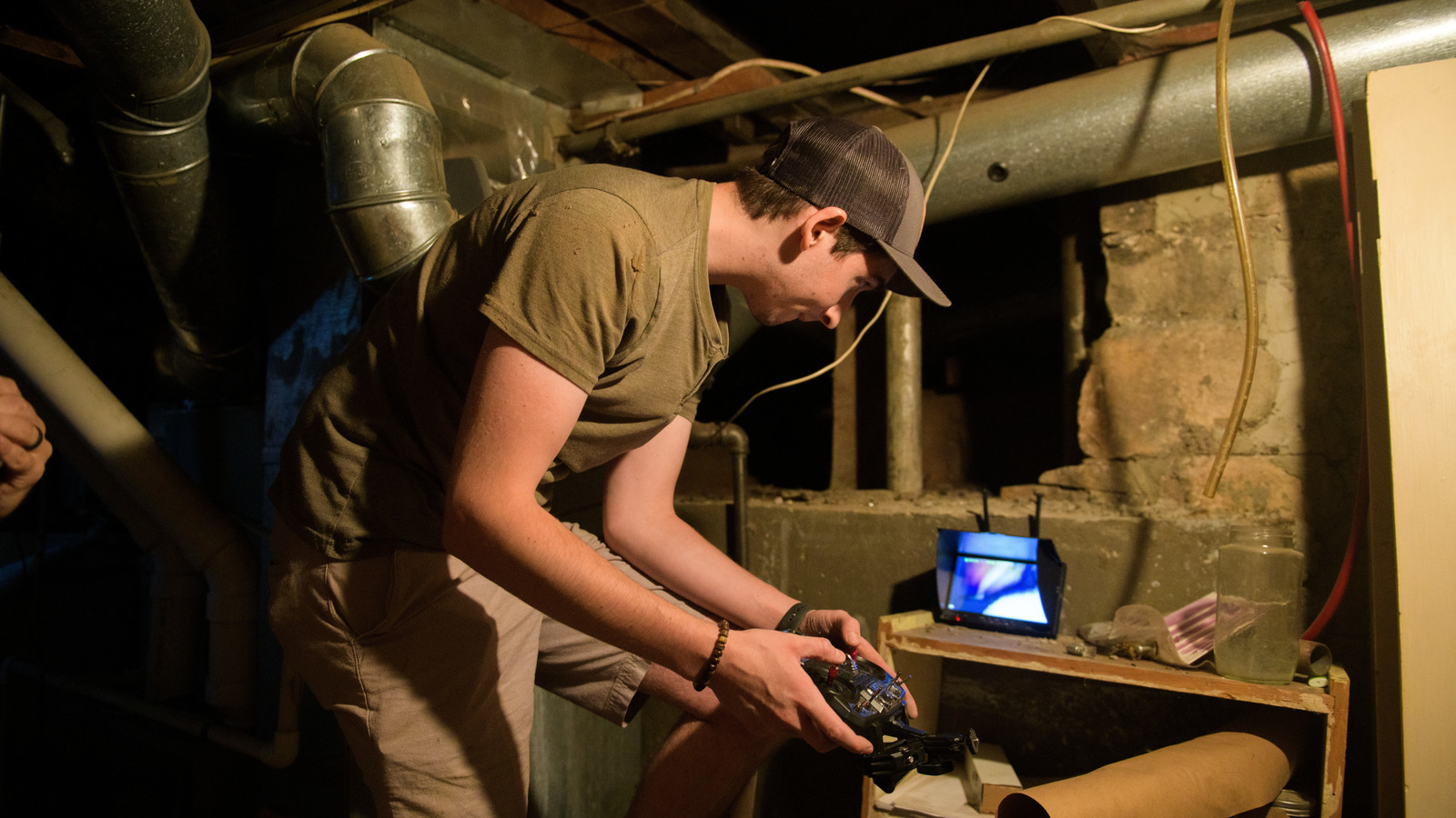 Uplink Robotics LLC employees proceed with a program using tools.
