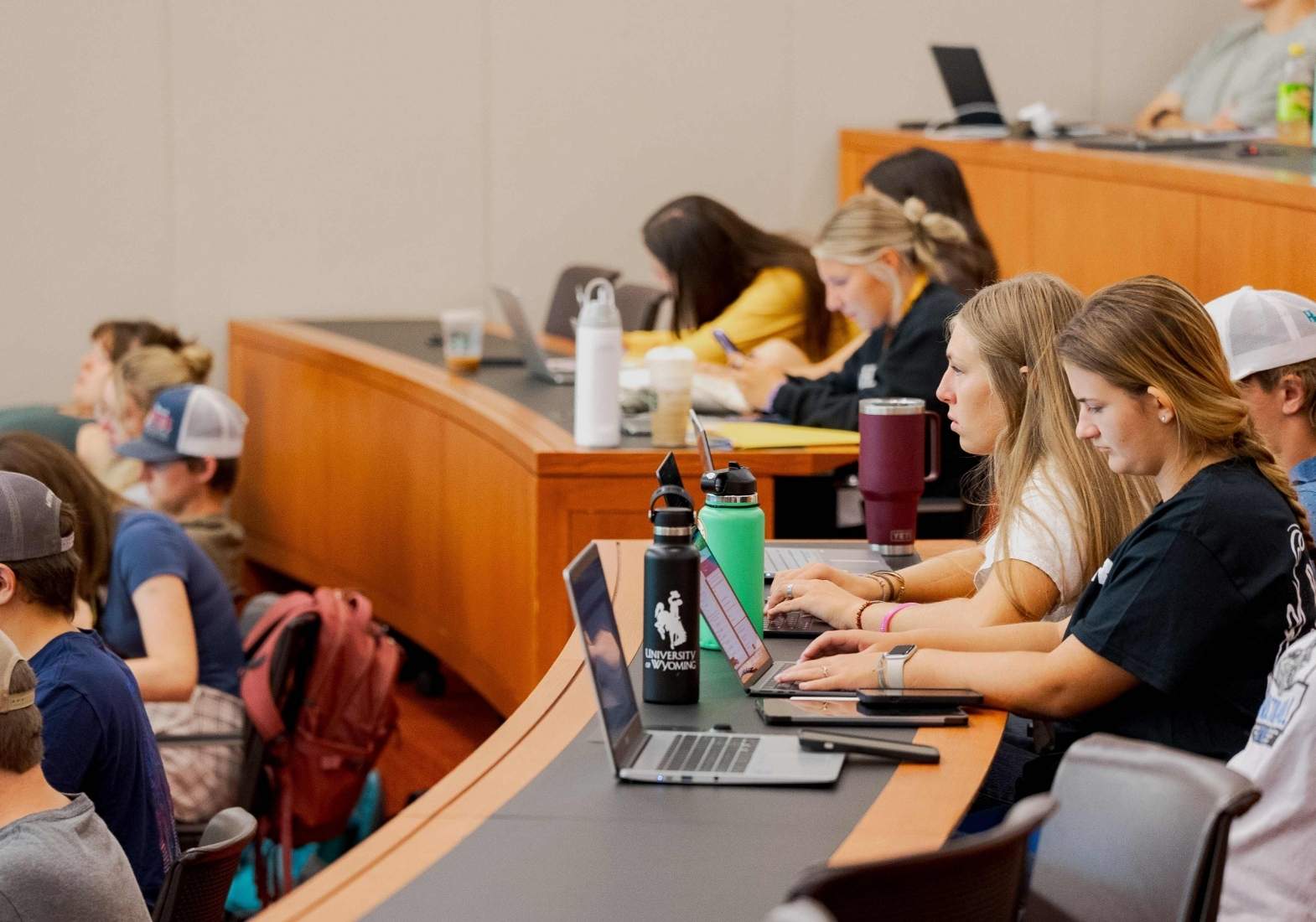 students in a classroom setting in the UW College of Business