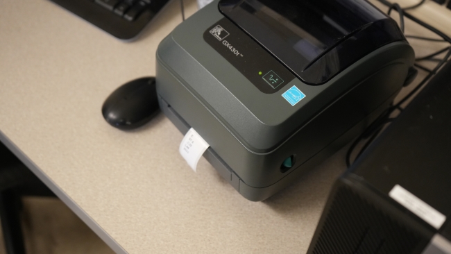 Processing a library book.