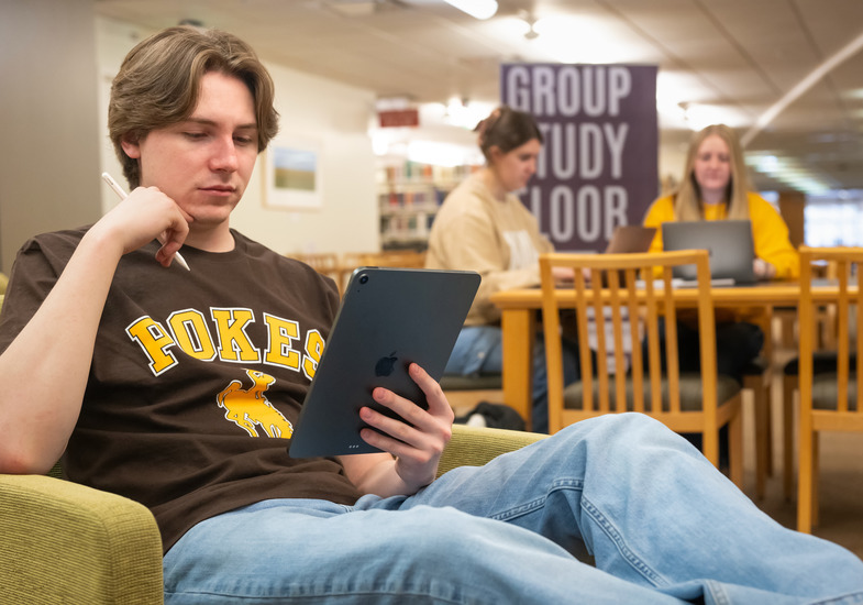 A student working on a tablet.