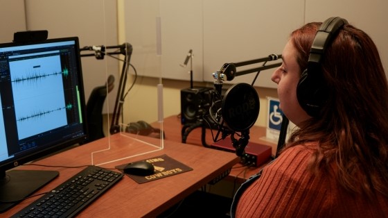 A student using the Studio Coe Audio-Recording Space.