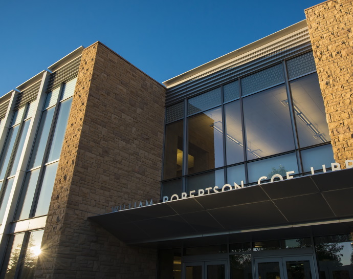 The exterior main entrance of Coe Library.