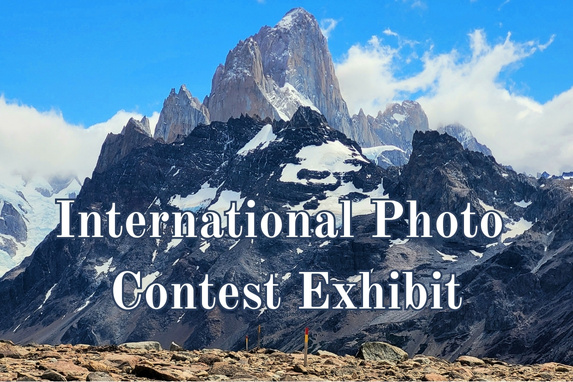 photo of mountains and text that reads 'International Photo Contest Exhibit'