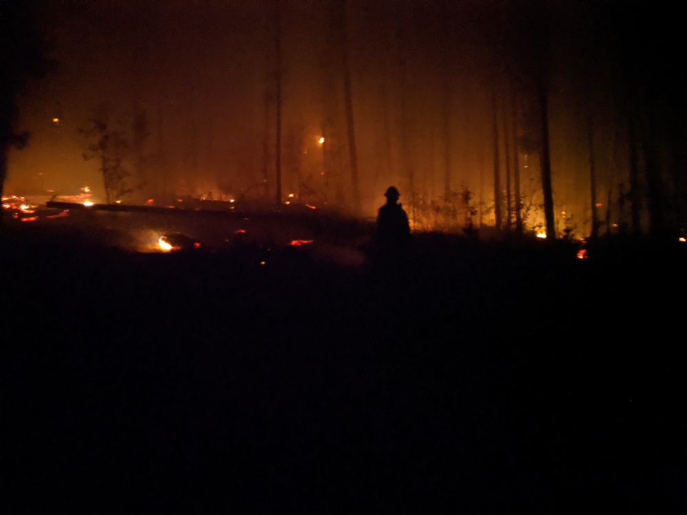 Mullen Fire - firefighting at night during structure protection