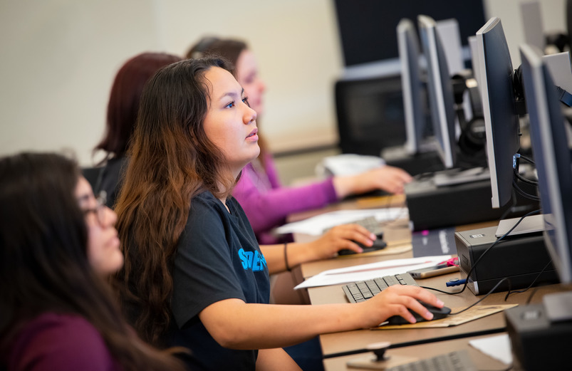 A student on a computer.