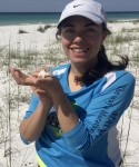 Nicole Bedford holding a small animal