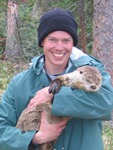 Jamie Crait holding an otter