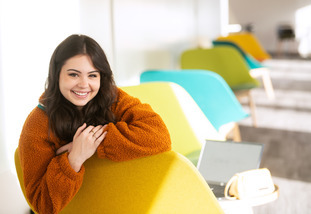 Student sitting on campus