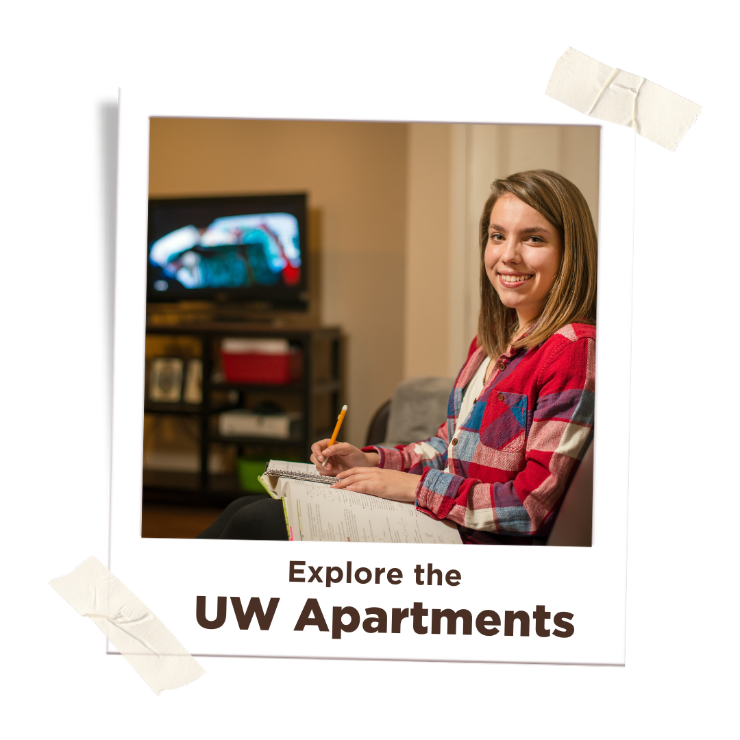 Explore the UW Apartments with image of student studying in her Bison Run Village apartment