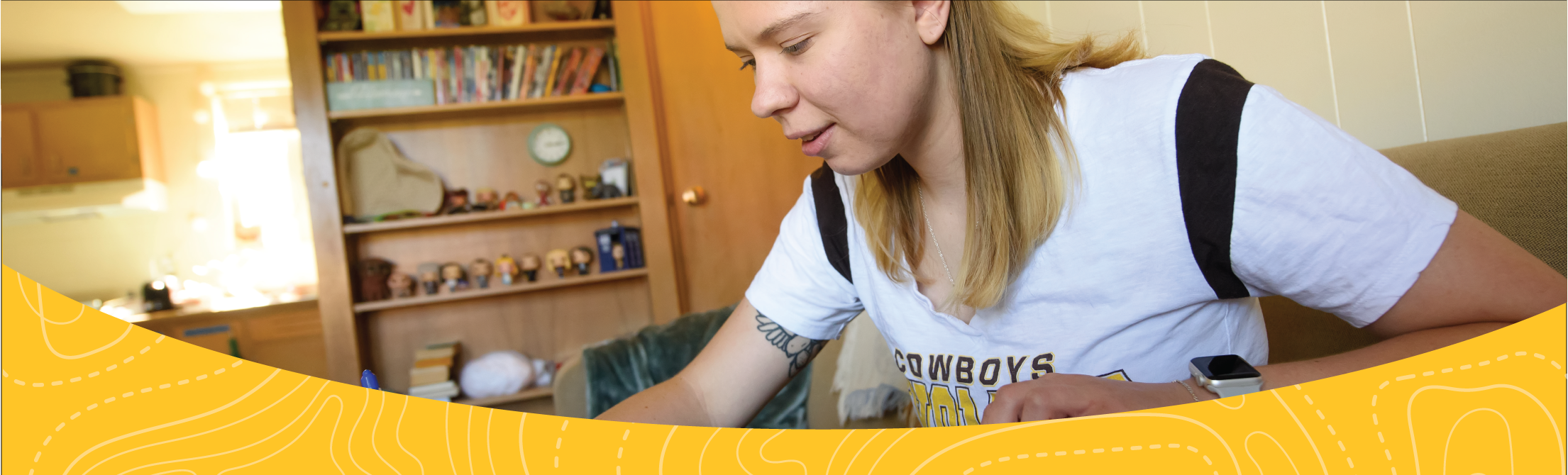 Female student doing homework in her Landmark Apartment