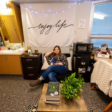 Student hanging out in their residence hall