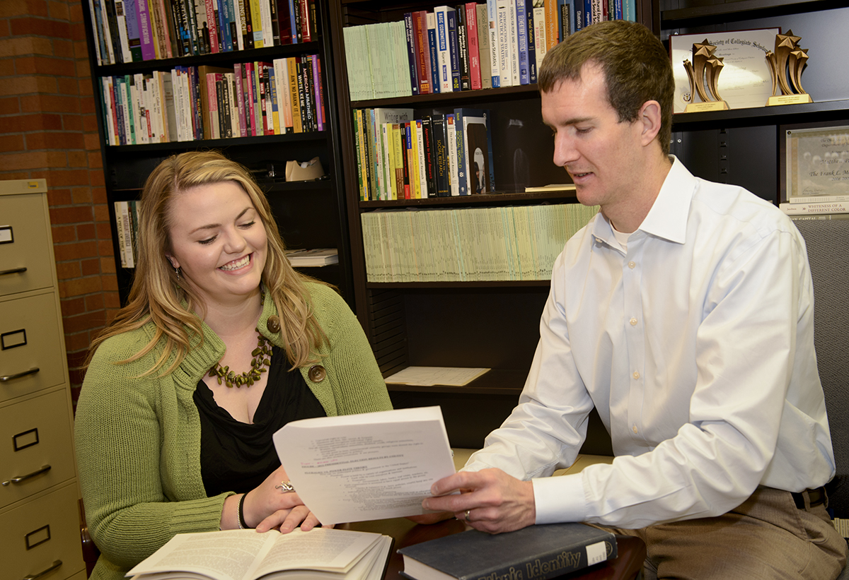 picture of an advisor advising an advisee