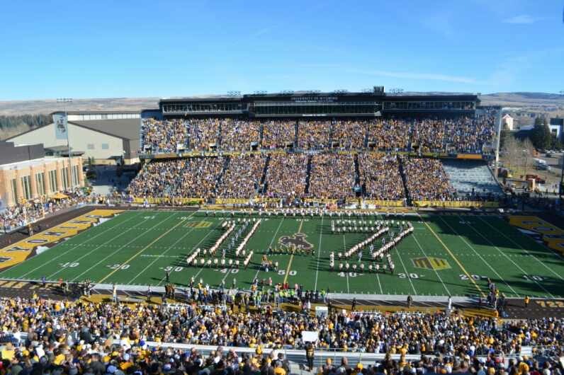 the Western Thunder Marching band in a '17' formation.