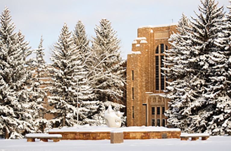 Photo of the Engineering Hall as viewed from a distance in the wintertime