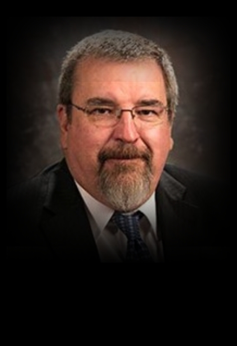 professional headshot of denny coon