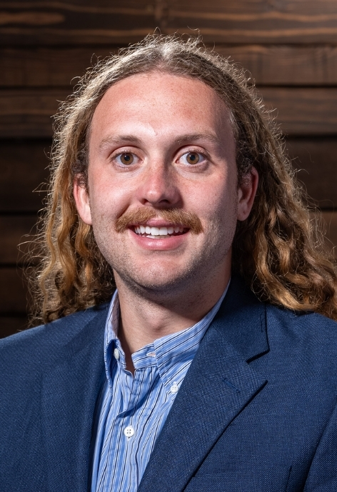 professional headshot of daniel rau