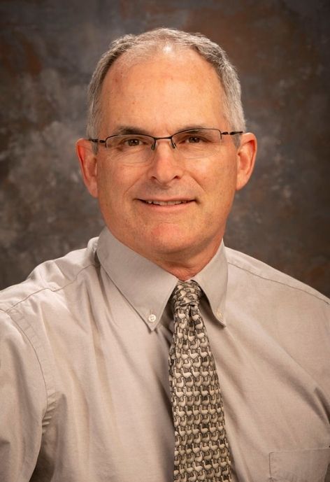 Professional Headshot of Jonathan Naughton