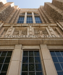 photo shot at low angle of the engraving over the front doors of the legacy engineering building, the engraving reads Engineering Hall.
