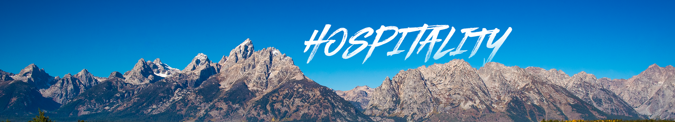 Grand Teton National Park with the word hospitality overlaid 