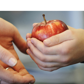 handing someone an apple