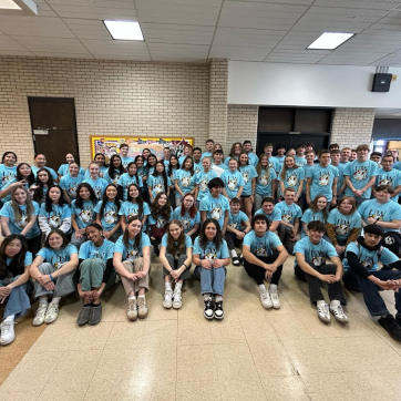 Students from Gillette pose in their WLD t-shirts