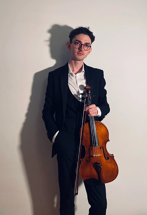 Man holding viola on white background