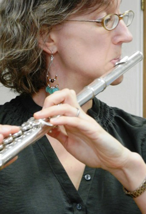 Photo of Nicole Riner performing flute