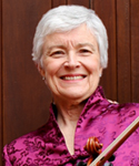 Professor Glesse Collet holding a viola