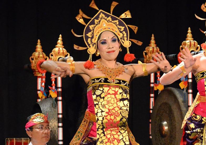 Dance instructor Ni Ketut Marni performs a dance at a Candra Wyoga concert