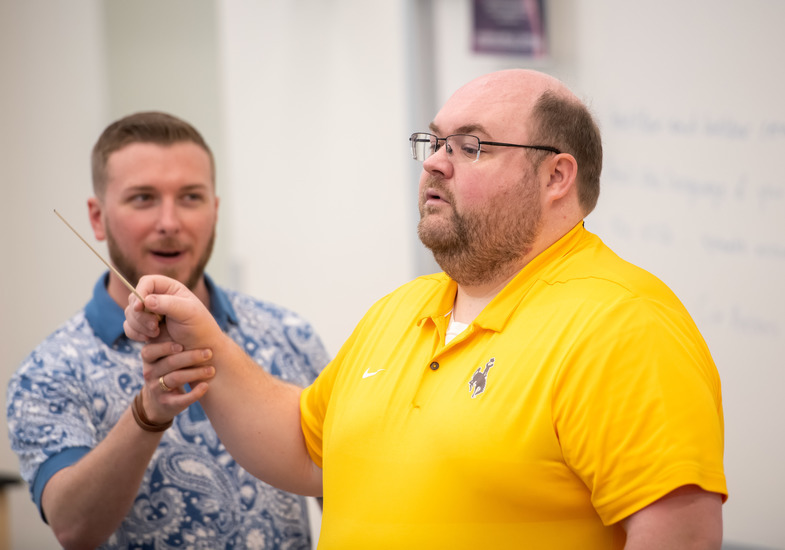 Music education student learning to conduct