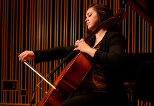 student plays cello