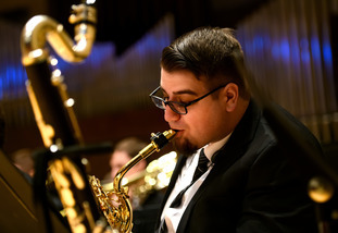 performer playing thier instument