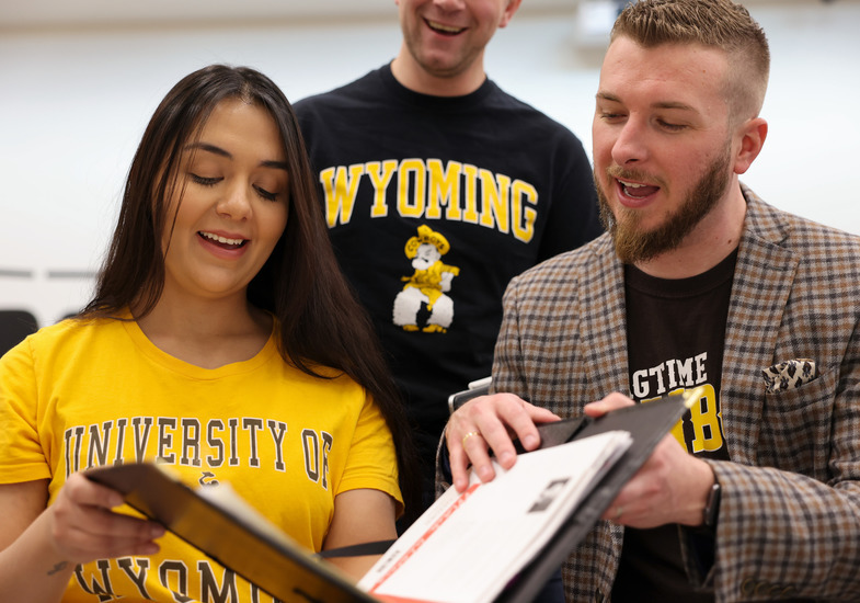 students sing
