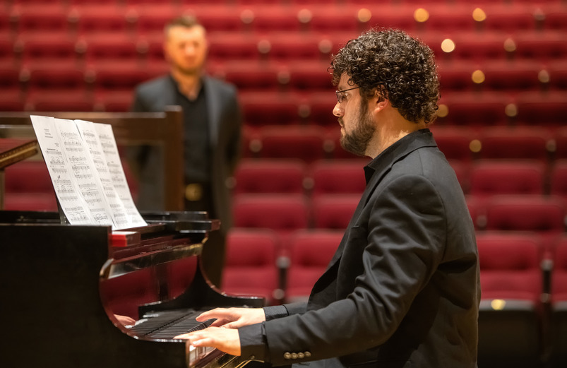 Pianist performing in concert hall