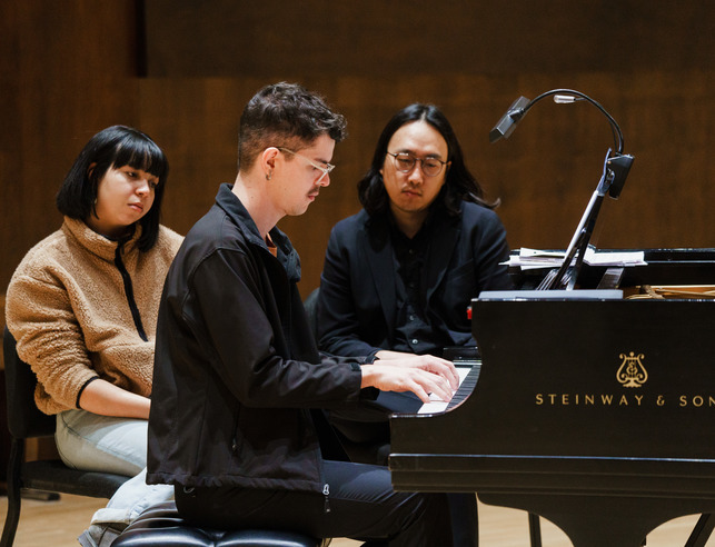 Pianist performing in concert hall