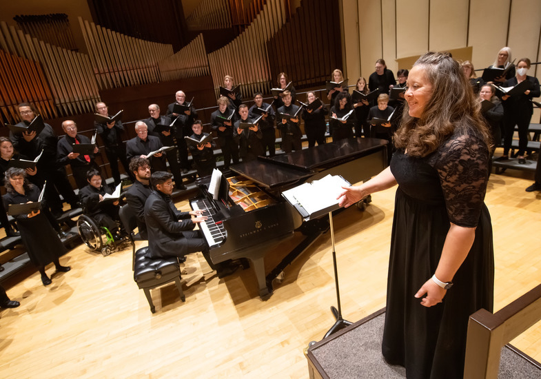 Pianist collaborating with a UW choir